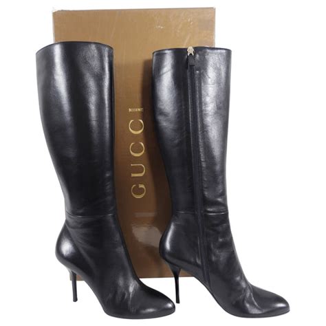 gucci black leather tall boots with gold front spurs|Gucci boots women black.